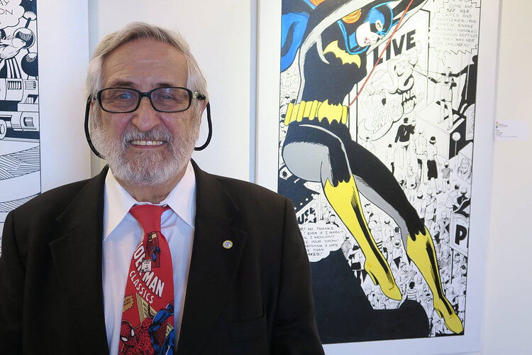 Jose-Delbo-with-his-cartoon-art-at-CCE