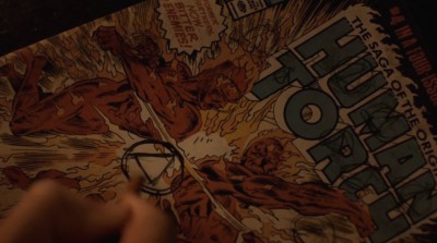 Revolution-S2x06-Aaron-is-drawing-the-Patriot-symbol-on-the-Human-Torch-comic-book-400x223